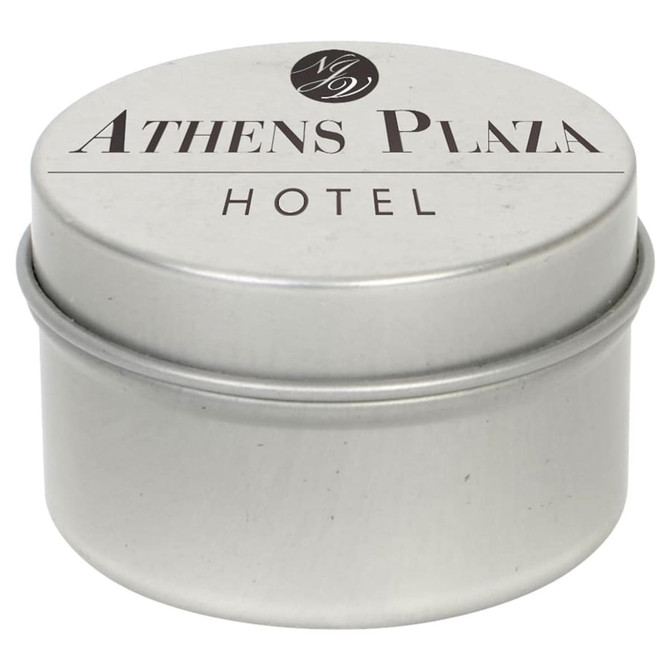 A silver tin candle with a smooth surface, featuring a logo and text for the Athens Plaza Hotel.