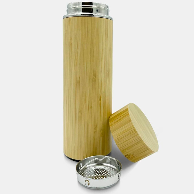 A drink bottle with a bamboo exterior and silver accents, featuring a removable cap and a stainless steel base.