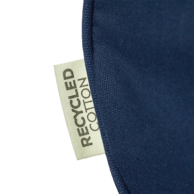 A close-up of a navy fabric featuring a label that reads "Recycled Cotton".
