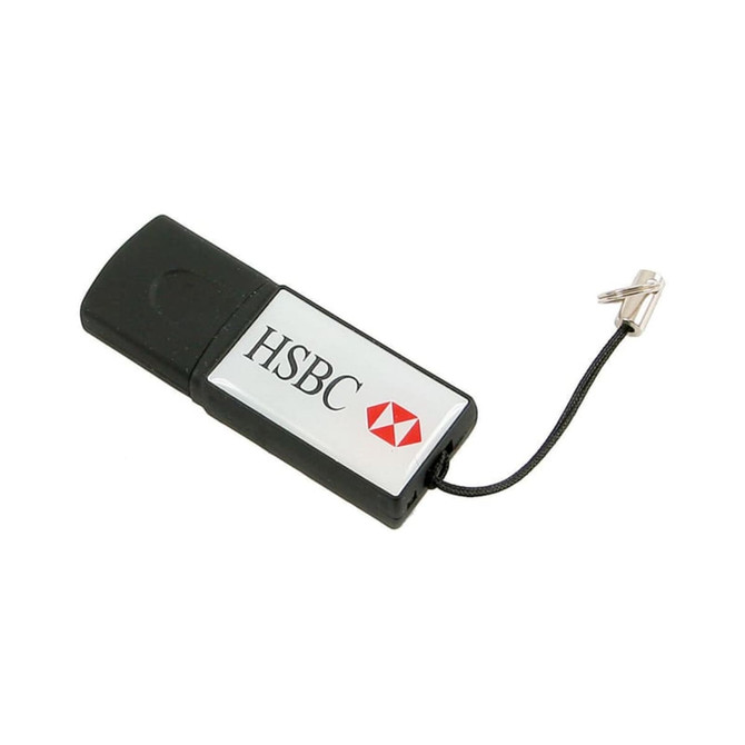 A black and silver flash drive with a logo and a small attachment loop.