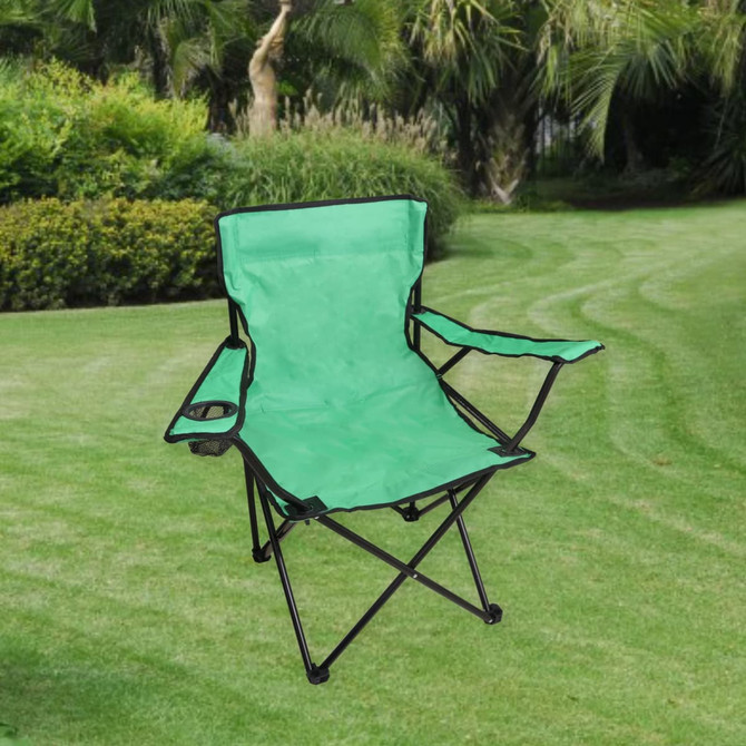 A green foldable portable camping chair with a black frame, featuring a side pocket, set on a grassy area.