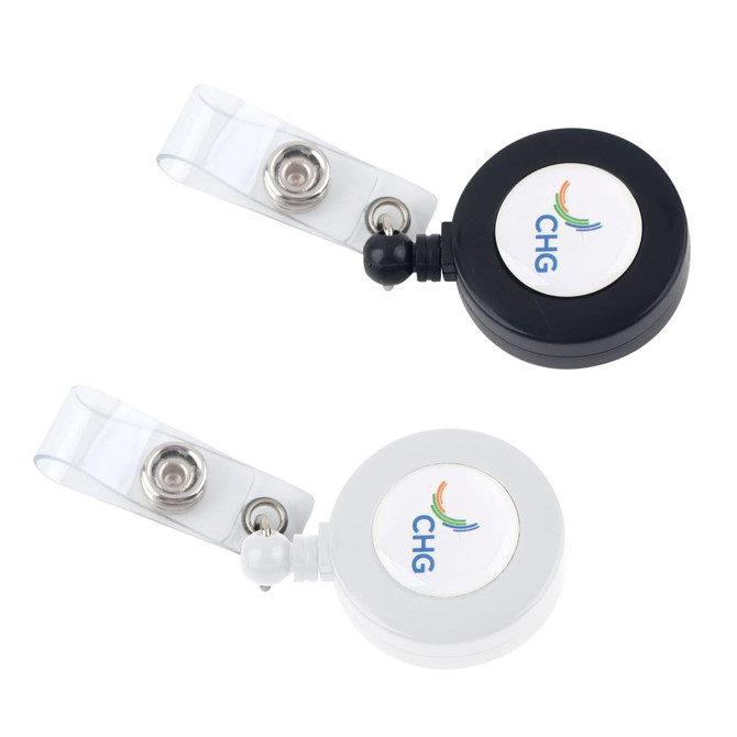 A round retractable card holder in black and white, featuring a logo on the front and a clear attachment strap.