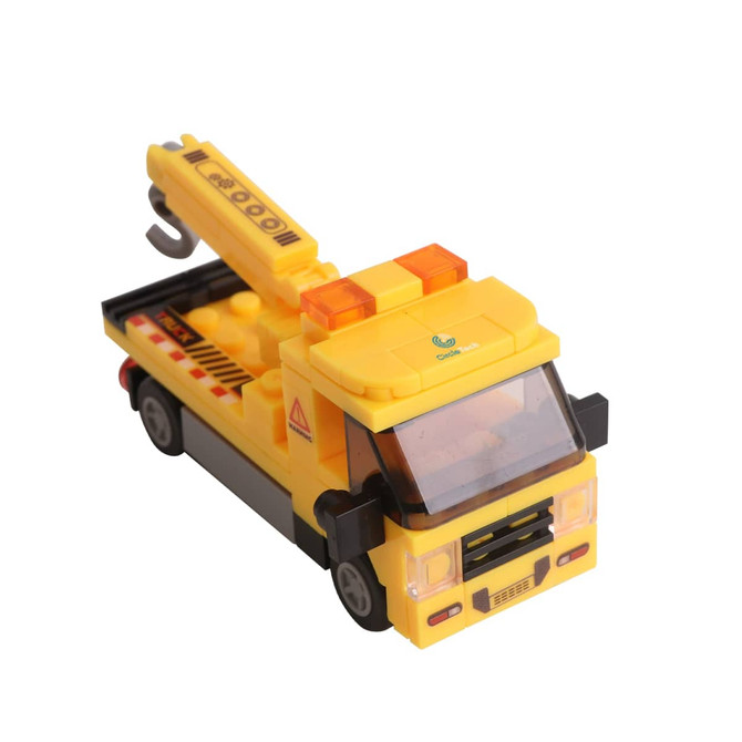 A yellow building block toy truck with a crane and safety markings, featuring a logo on the side.