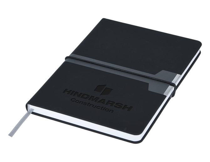 A black A5 notebook with an elastic band and branding, featuring a sleek design and a side pocket.