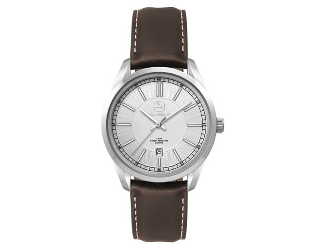A silver ladies casual dress watch with a brown leather strap and a minimalist face design. It features a logo.