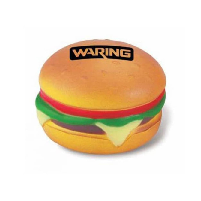 A hamburger-shaped stress reliever in yellow and brown, with red and green detailing, featuring a logo on top.