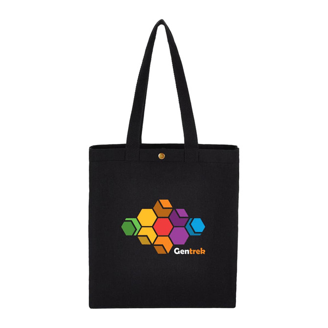 A black recycled cotton tote bag featuring a colourful geometric design and a logo, with long handles and a snap closure.