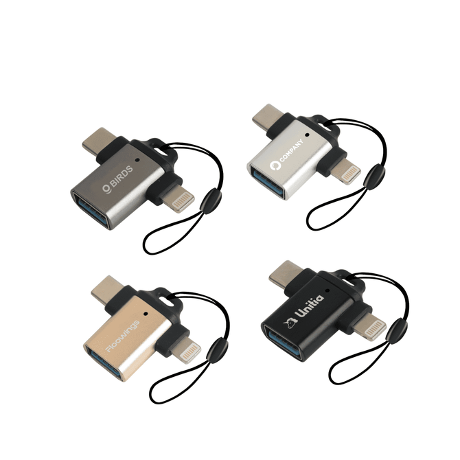 A set of four USB 3.0 to USB C Lightning OTG adapters in silver, gold, and black, each with a lanyard.