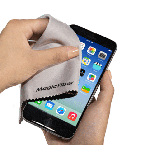 A hand using a grey microfibre lens cloth to clean a smartphone screen. The cloth features a logo.