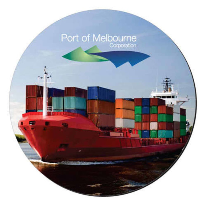A round mat featuring a red cargo ship loaded with colourful shipping containers, set against a blue sky.