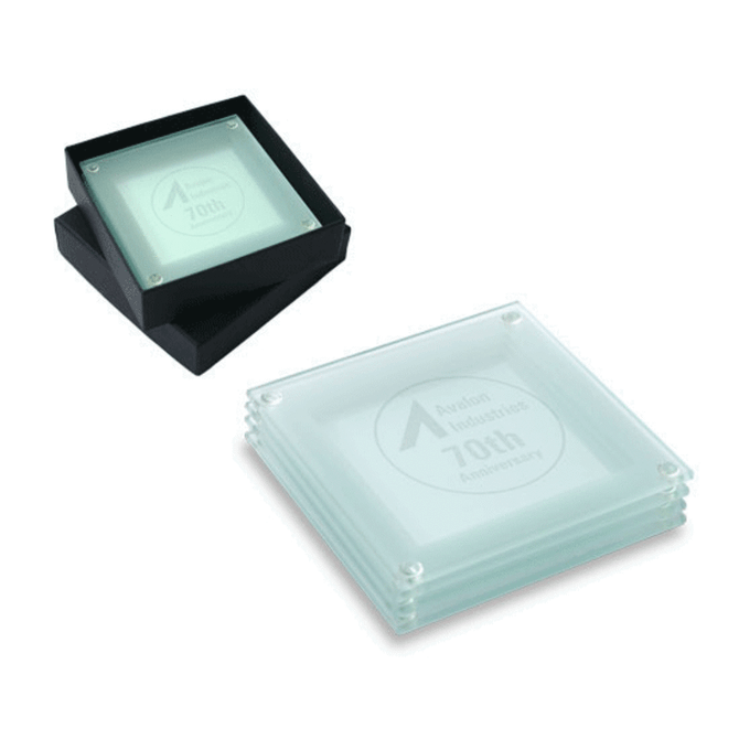 A set of four clear glass coasters stacked with a black storage box. Each coaster is square and slightly frosted.