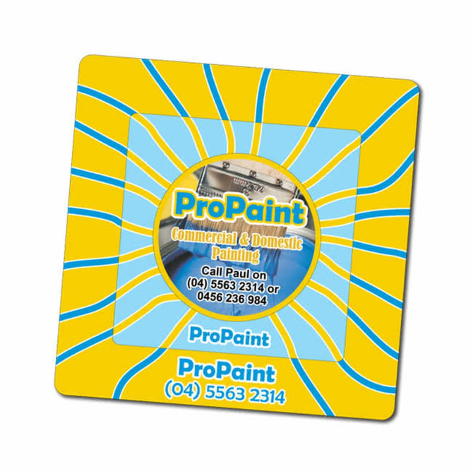 A square magnetic photo frame featuring a circular centre with a logo, set against a bright yellow and blue swirled background.
