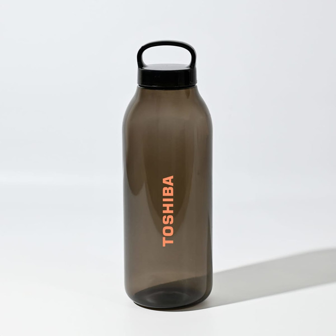 A drink bottle in smoky grey with a black lid features a logo. It has a reusable design for eco-friendly use.