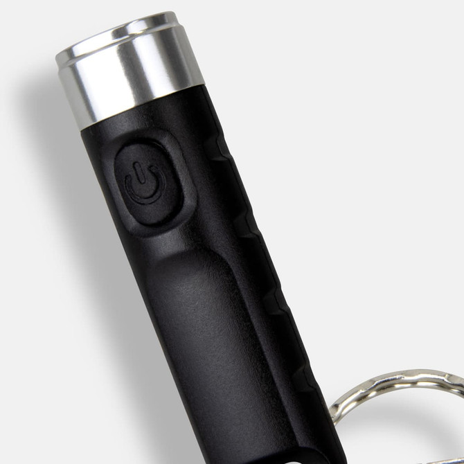 A rechargeable torch keyring in black with a silver top, featuring a power button and a keyring attachment.