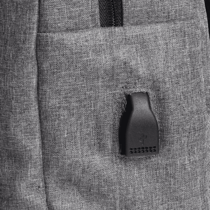 A grey backpack with zippered compartments, featuring a small branding logo on the side.