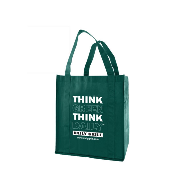 A large green reusable grocery bag with sturdy handles and a logo.