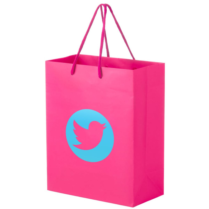 A pink laminated bag with handles and a circular logo featuring a bird design.