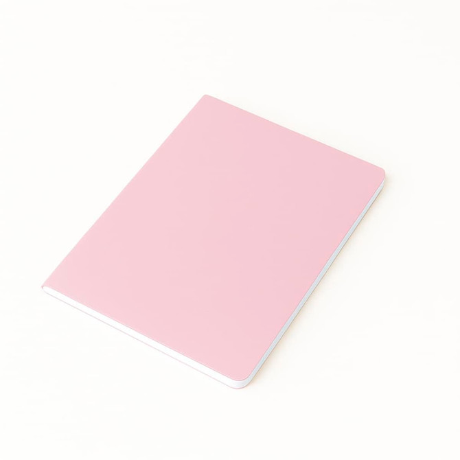 A5 thin notebook with a smooth pink PU cover, featuring a white edge and a minimalist design.