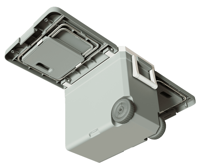 A grey cooler box with wheels, featuring a foldable table and chair. It has an integrated handle and a logo.
