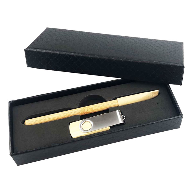 A bamboo pen and metal clip housed in a black gift box. The set features natural tones and a sleek design.