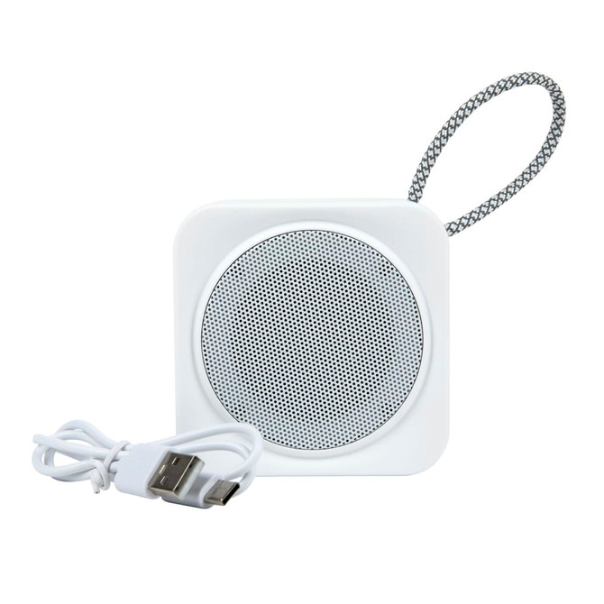 A white Pep Mini Speaker with a textured carry strap and a USB charging cable.