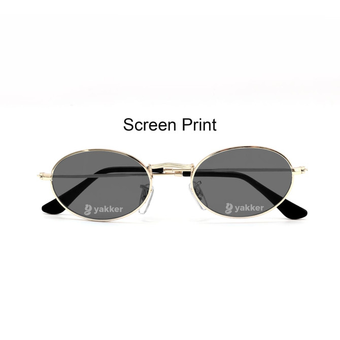 Oval retro sunglasses with a gold frame and dark lenses, featuring black temple arms and a logo.