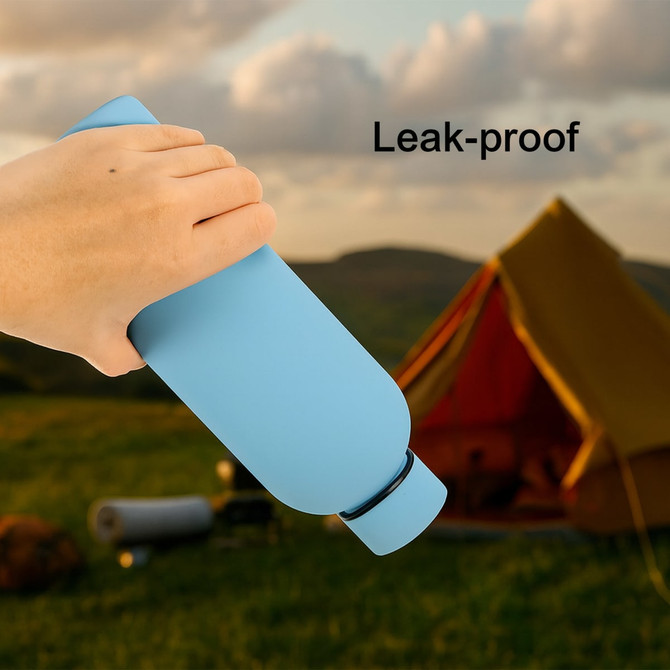 A drink bottle in blue, featuring a rubber coated finish and a leak-proof design. It has a logo on it.