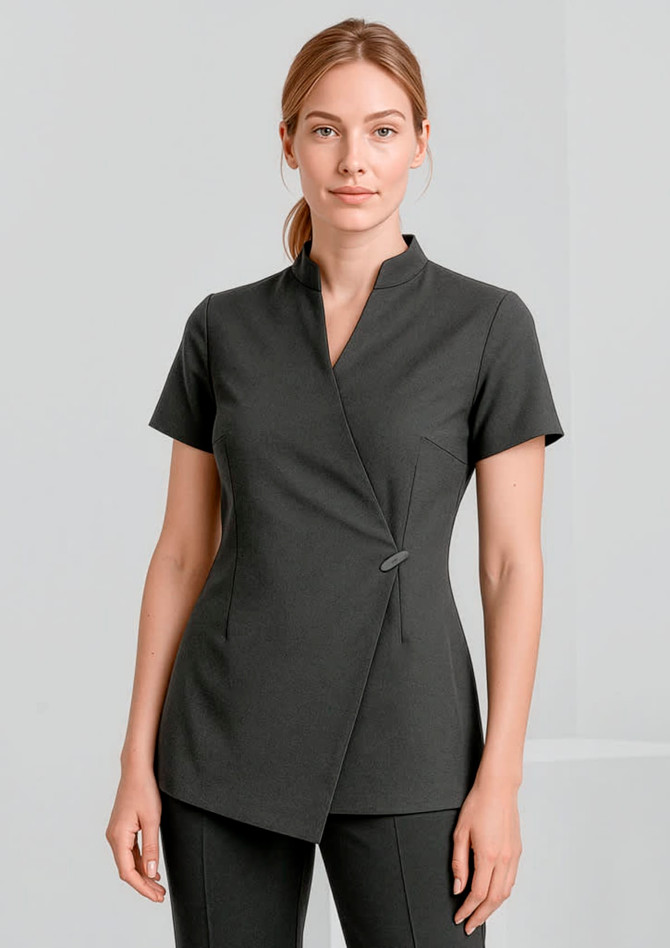 A dark grey women's tunic with a wrap design and short sleeves, featuring a brand logo.