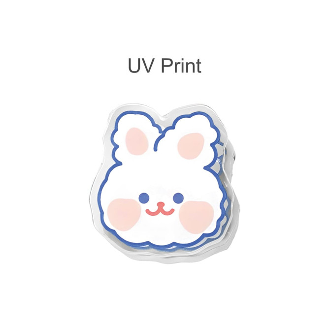 Acrylic clip featuring a cute white bunny design with pink accents and a blue outline. Includes a logo.