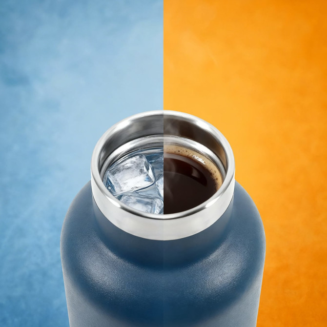 A drink bottle in blue stainless steel, featuring ice cubes and dark liquid in the opening, with a logo present.