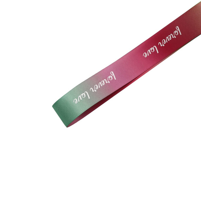 A ribbon in shades of pink and green, featuring the text "Flower Love" in white, with a smooth satin finish.