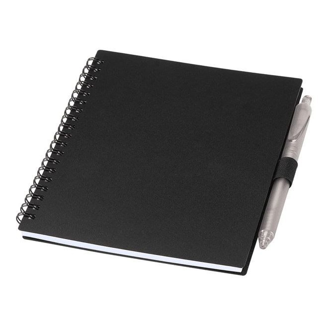 A black spiral-bound journal with a grey pen attached. The journal features a plain cover and white pages inside.