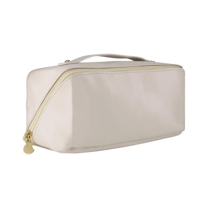 A light beige toiletry bag with a gold zipper and a handle, featuring a logo on the side.