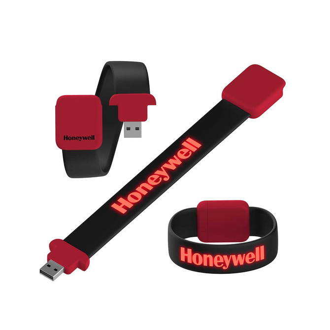 A black and red Arc Bracelet LED USB flash drive with a logo, featuring a flexible design for easy wear.