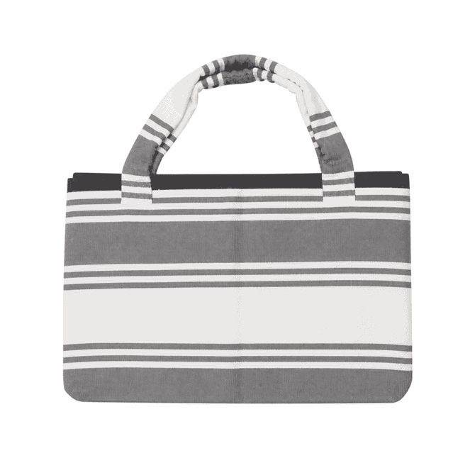 A foldable beach towel bag in grey and white stripes, featuring sturdy handles and a fabric texture.