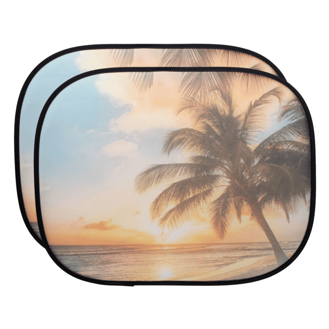 A pair of car sunshades featuring a colourful beach scene with palm trees and a sunset. Each shade has a black border.