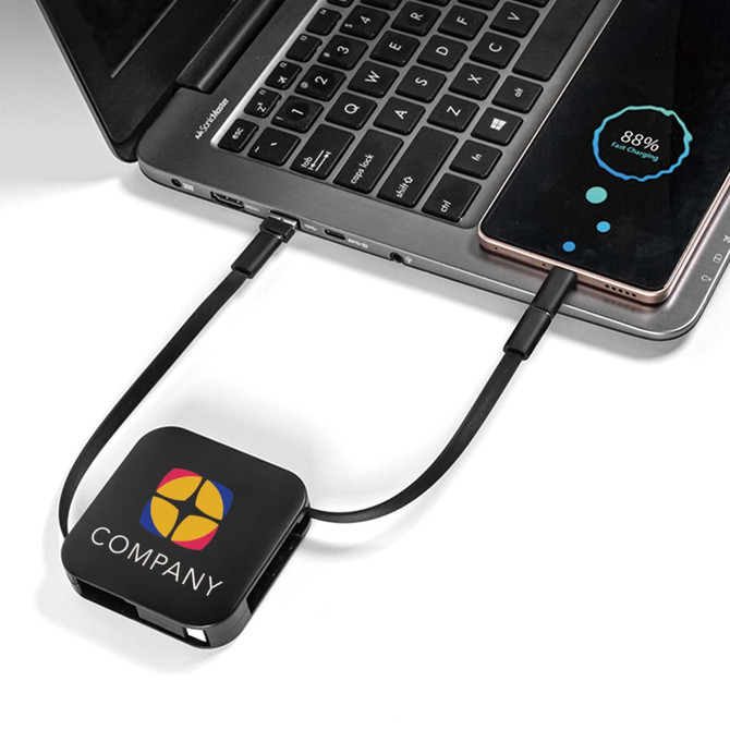 A black 60W 4-in-1 retractable charging cable connected to a laptop, featuring a logo.