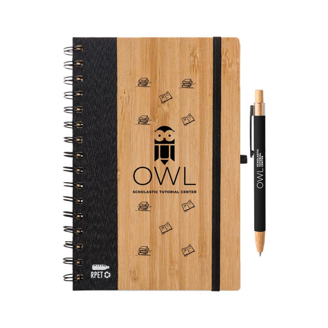 A wooden notebook with a spiral binding and a black pen, featuring a logo on the cover.