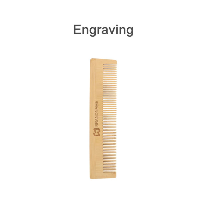 A fine-tooth bamboo comb in a natural light brown colour with a logo. Features engravings along the handle.