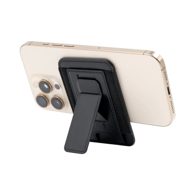A phone with a black stand attached to the back, featuring a textured exterior. The phone is gold in colour.