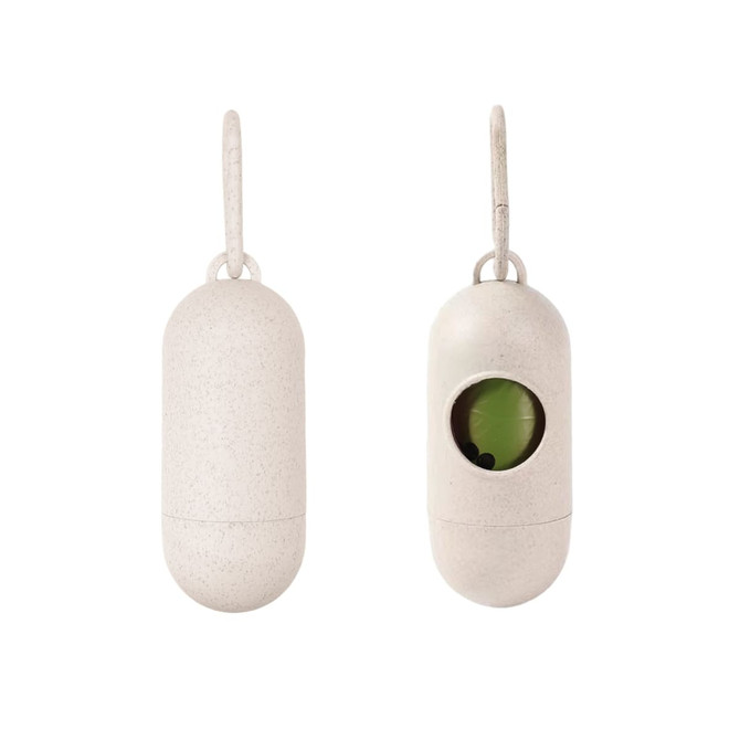 An eco-friendly white capsule-shaped pet waste bag dispenser with a visible compartment for bags and a hanging loop.
