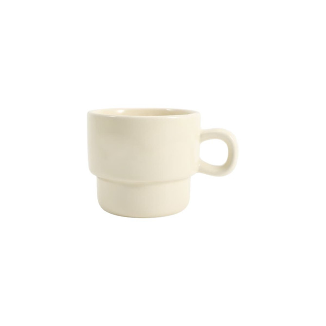 A stackable ceramic mug in a soft cream colour, featuring a rounded design and a comfortable handle.