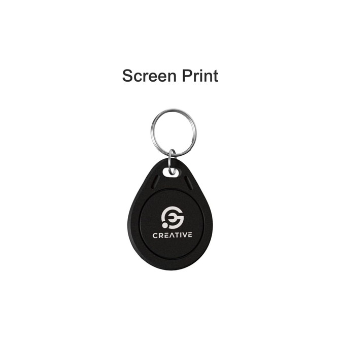 A black NFC keytag with keyring and a circular logo on the front.
