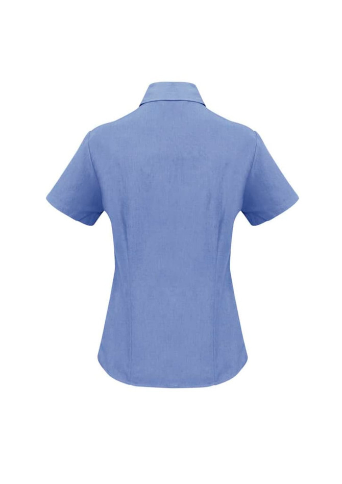 A blue short sleeve button-up shirt with a collar and a branded logo on the back.