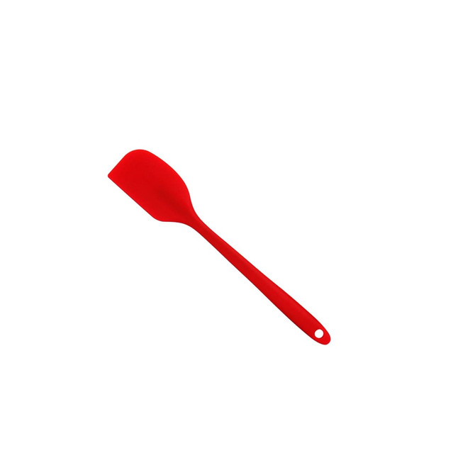 A red silicone spatula with a flat head and a long handle, featuring a hanging hole at the end.