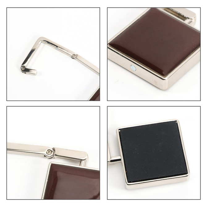 A square foldable desk hook in burgundy and black, featuring a metallic frame and a logo on the surface.