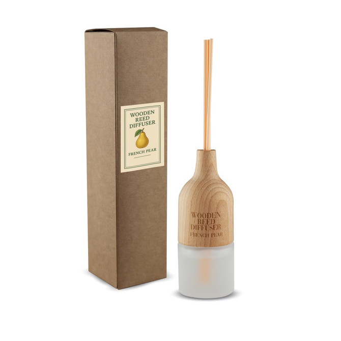 A wooden reed diffuser with a cylindrical base and two reeds, packaged in a brown box. The diffuser has a light colour.