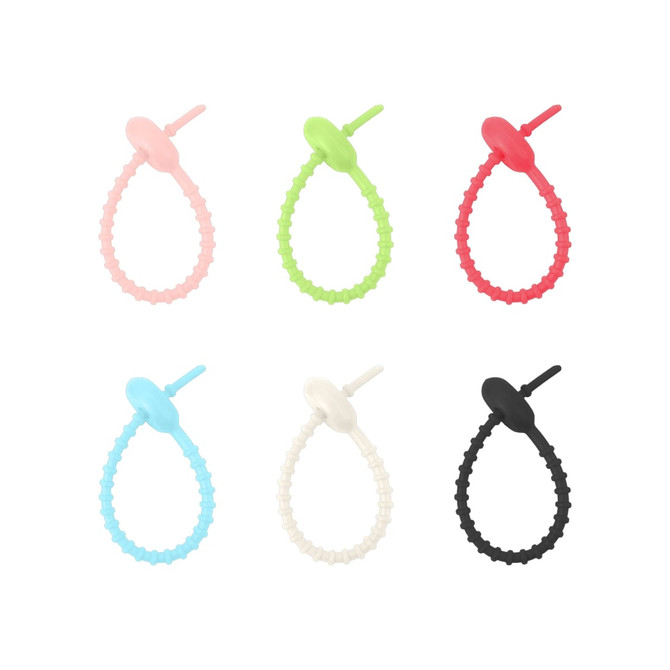 A set of six custom felt logo hanging tags in pink, green, red, light blue, white, and black. Each tag features a loop design.