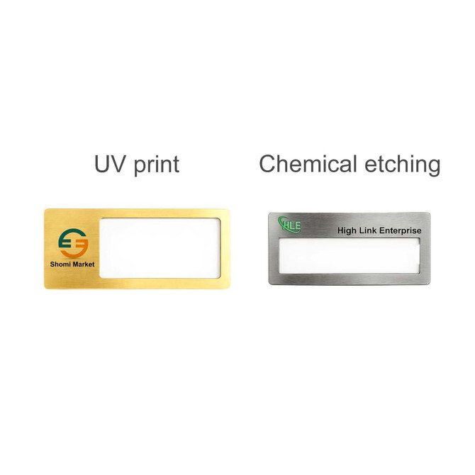 A metal name badge featuring a gold finish on the left and a silver finish on the right, with a branding logo.