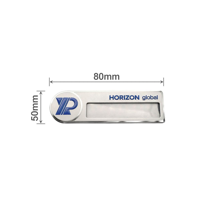 A custom reusable metal name badge featuring a silver finish with a blue logo and a clear window for a name.